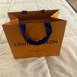 Louis Vuitton Bold Orange shopping Bag with Blue Handles